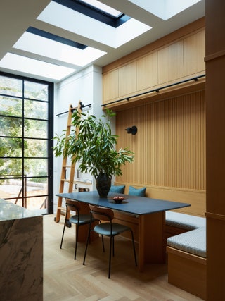 “We added an oaktrimmed opening between the kitchen and nearby dining and living spaces to create a bit of separation...