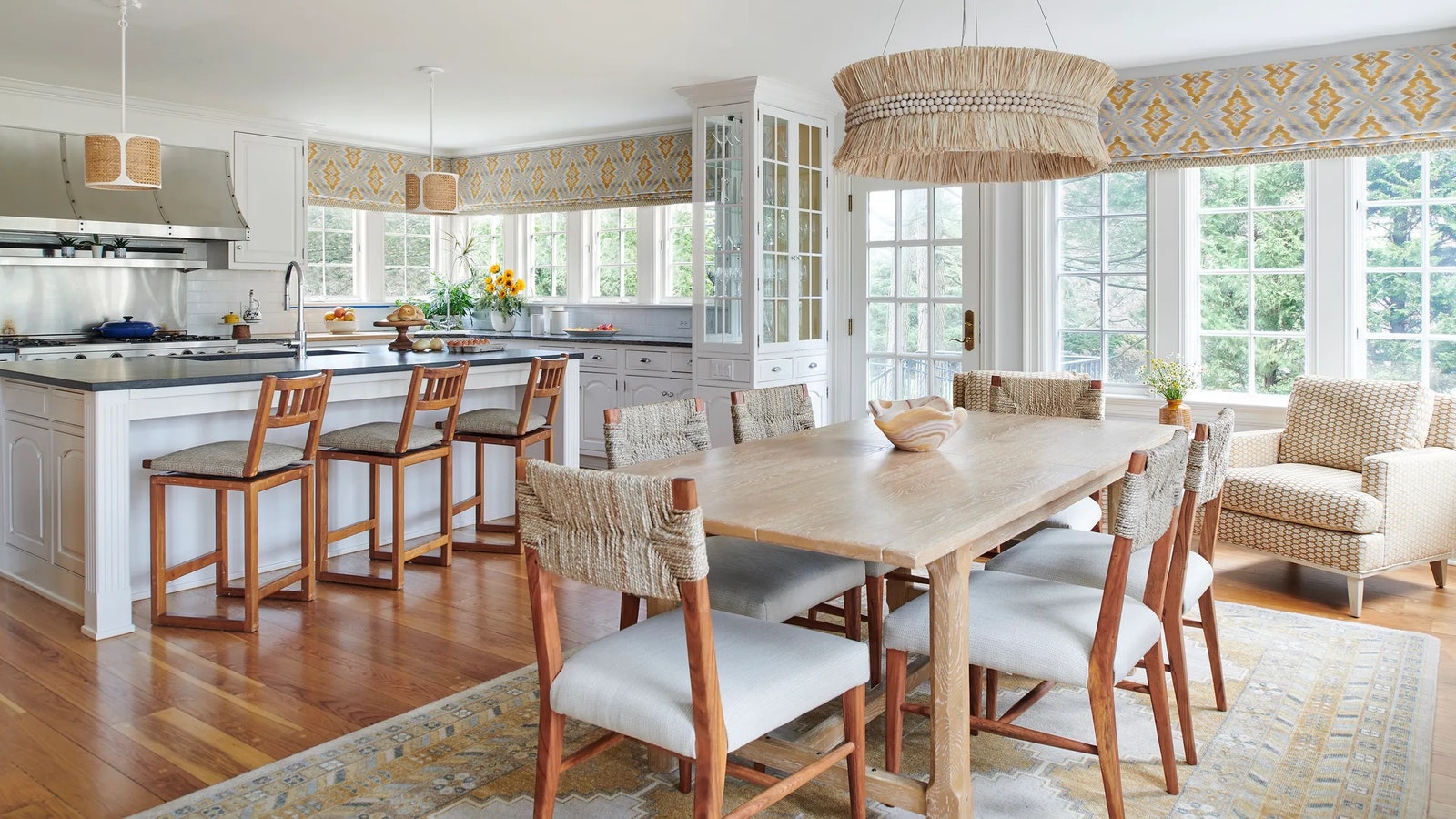 Soft sunny hues and natural fibers brighten a kitchen and breakfast area by Marni Sugerman.
