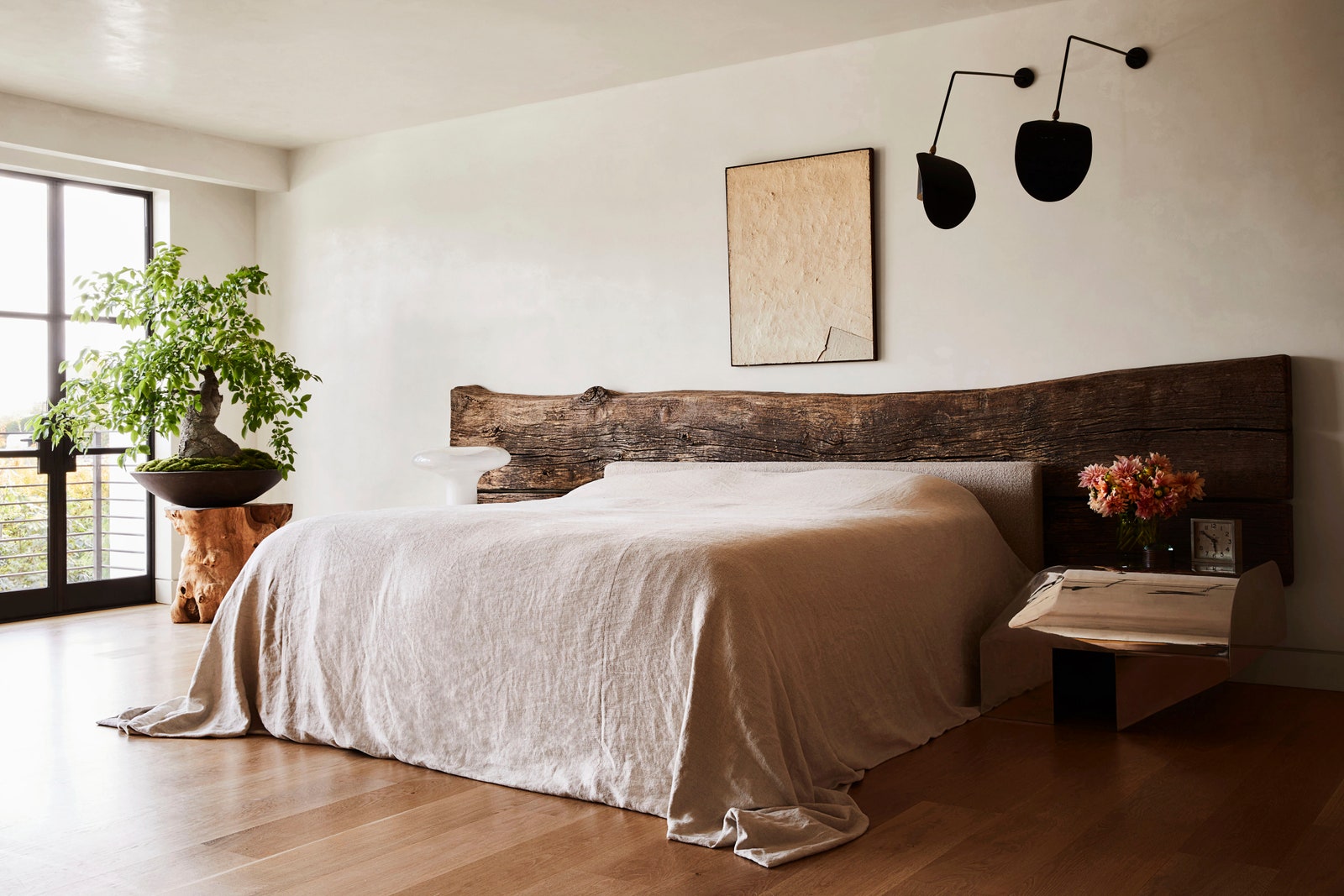Designer Jane Hallworth went with a natural freeflowing bedcover in the primary bedroom of Tinder founder Sean Rad and...