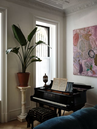 painting hung above piano