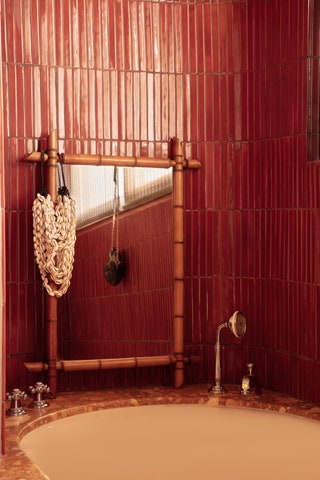 bathtub red tile walls