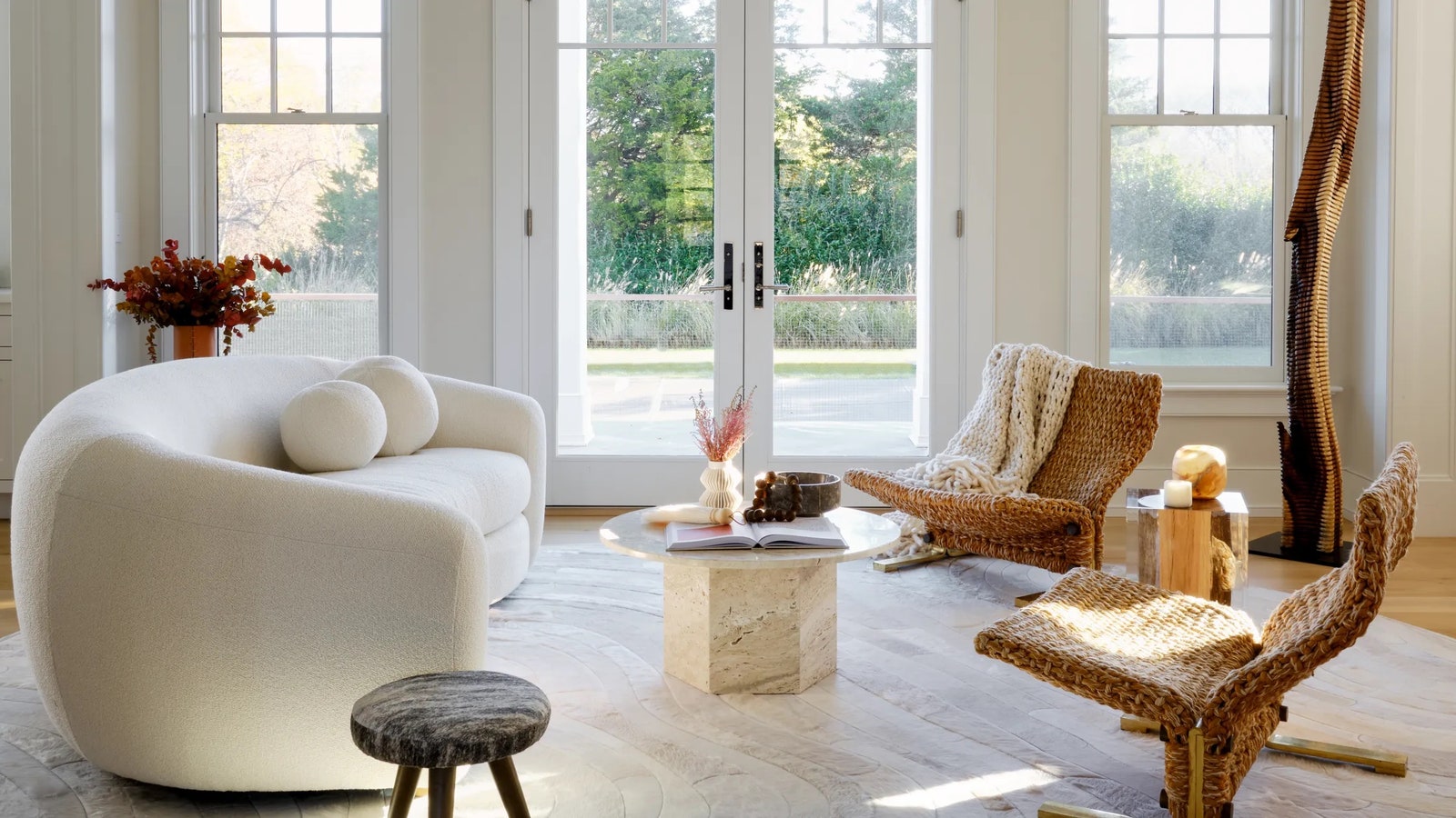 For the coastal living space of an East Hampton home Marina Hanisch Interiors wanted to create a fluidity between the...