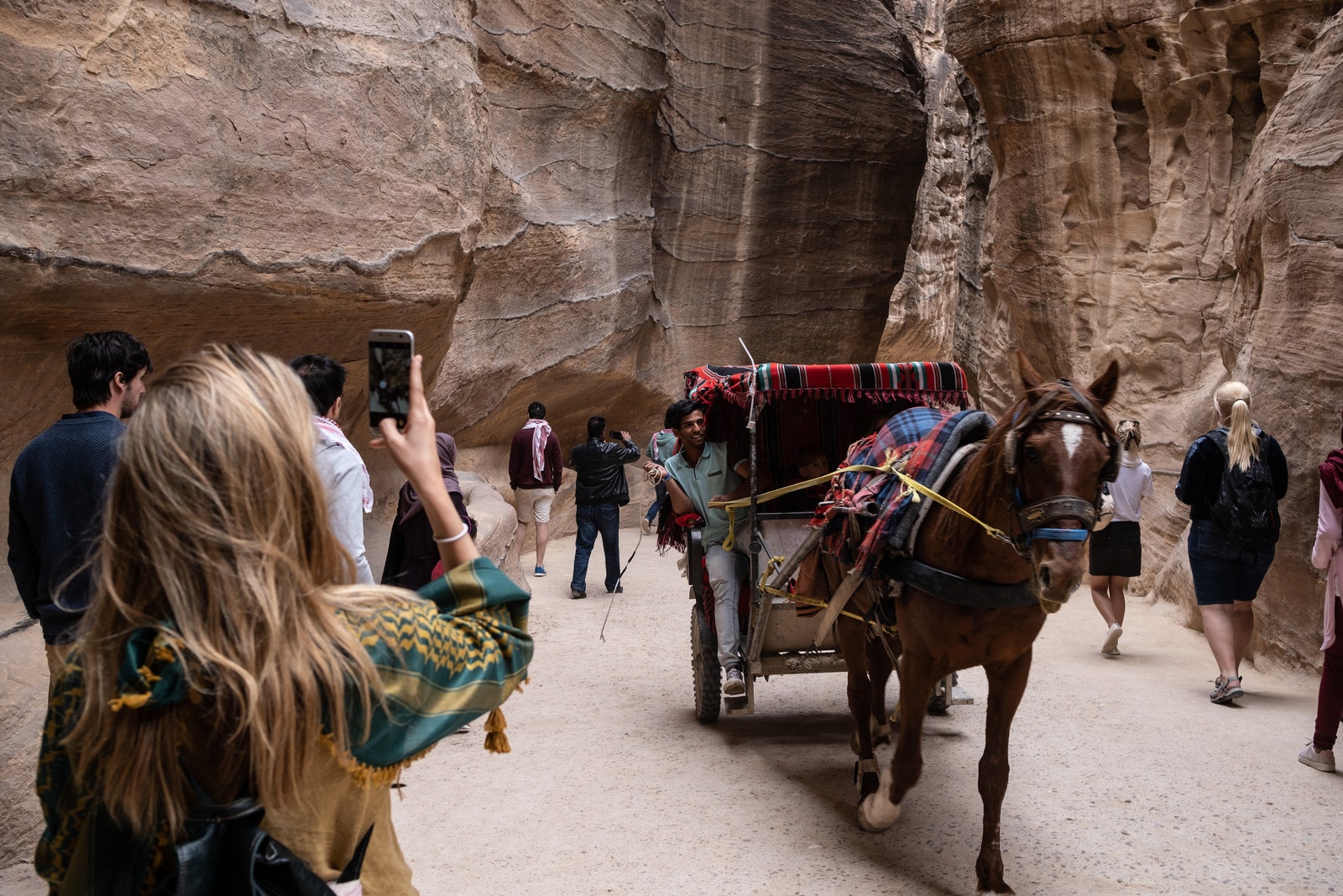 Petra Jordan historic site with horses and tourists