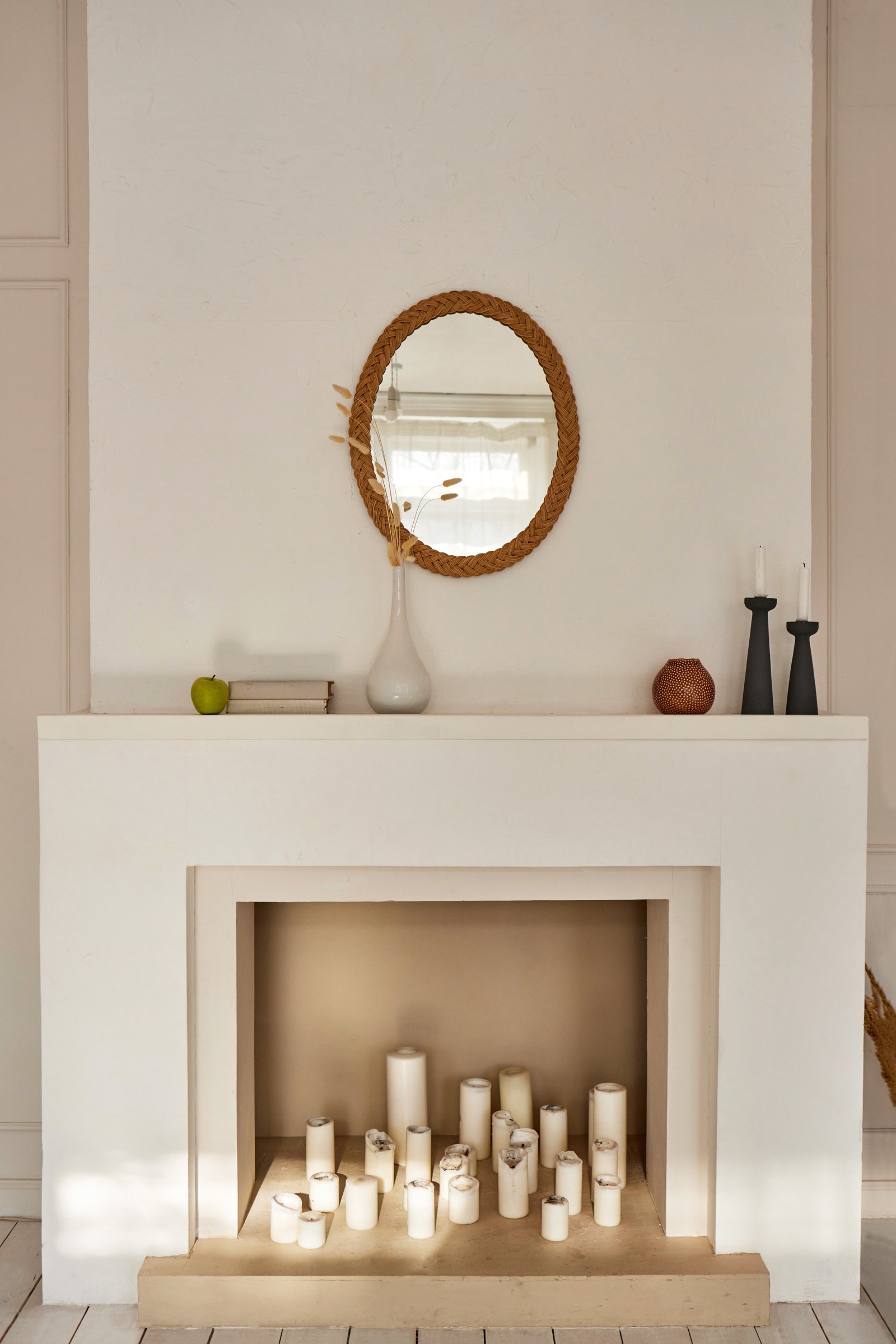 These slick ceramics give the mantelpiece an artistic flair and allow for the perfect display of seasonal flora for a...