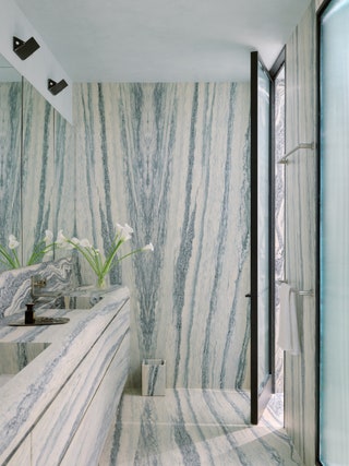 “The marble is kind of riotous” says the husband of the Cremo Tirreno slabs they selected from ABC Stone after an...
